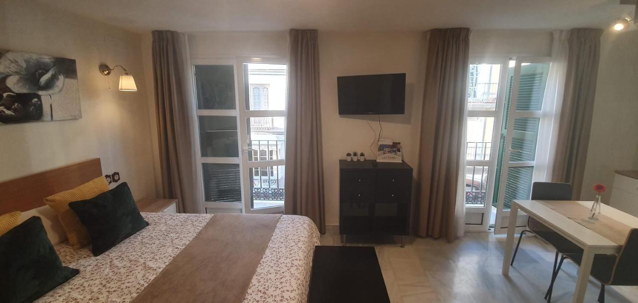 Fan Flat Carreteria Apartment Malaga Bagian luar foto